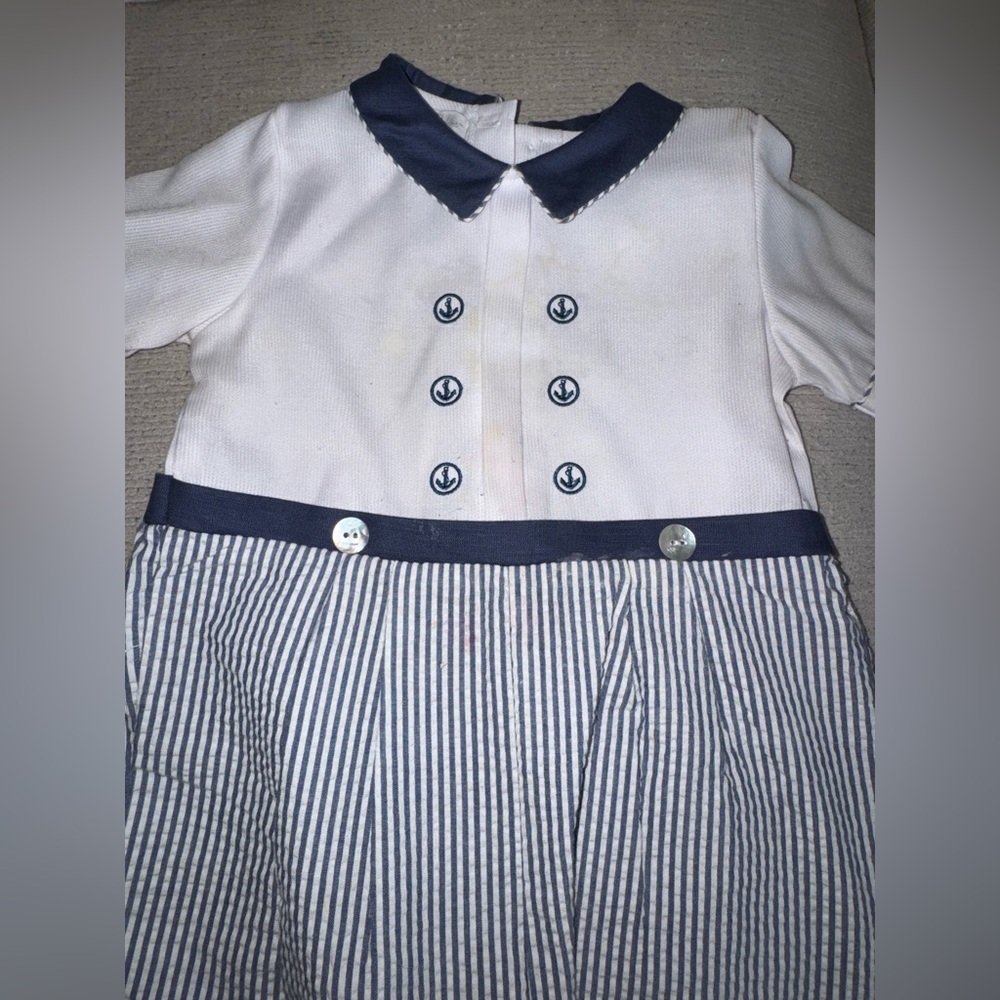 Nautical Baby Romper with Navy Accents, white area has milk stains.